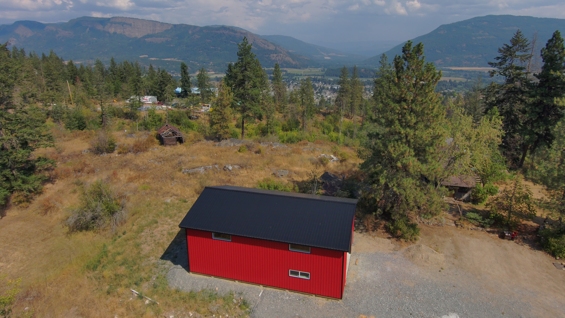 Aerial view of acreage shop in the South Okanagan with mountain views