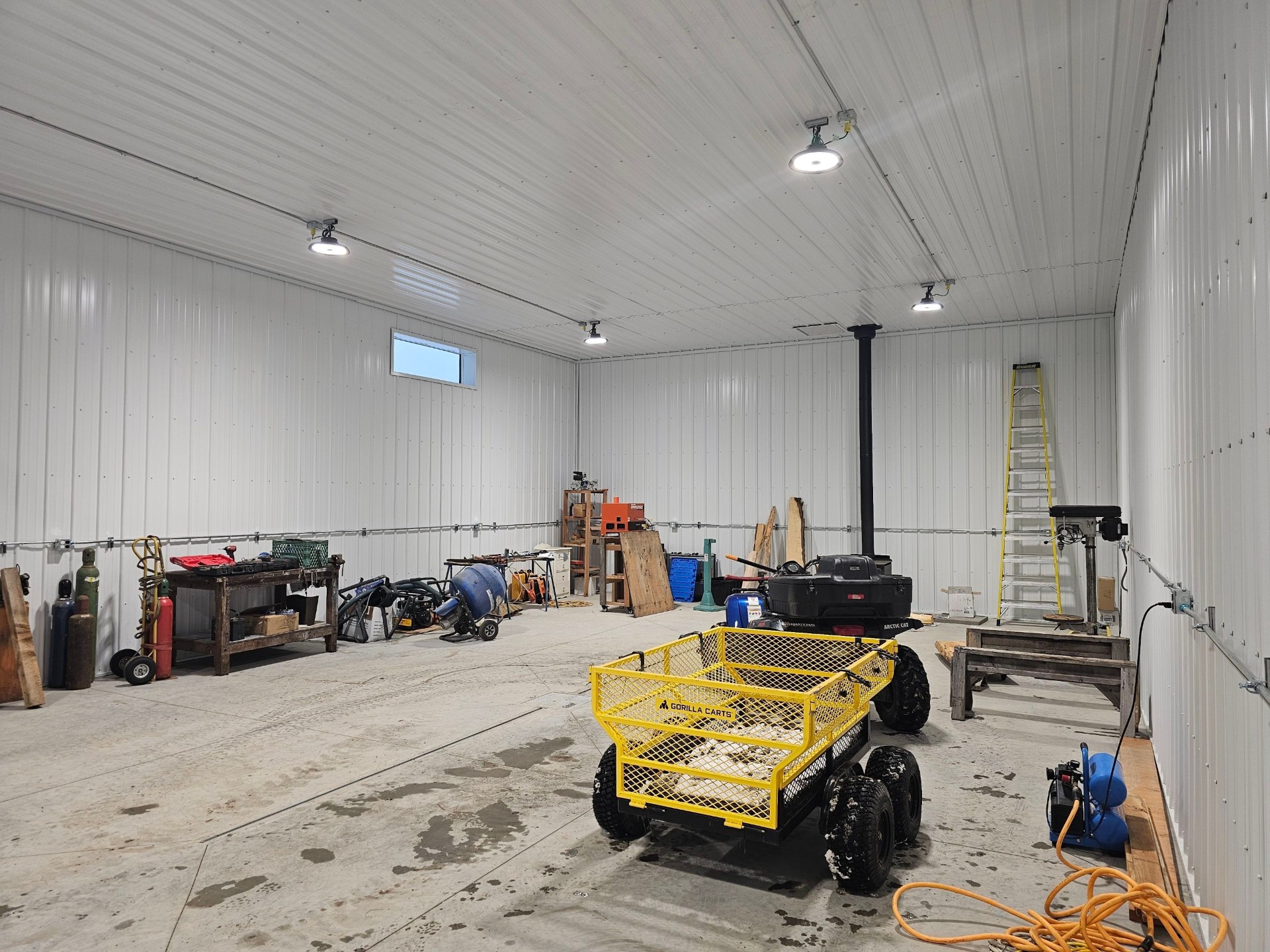 Interior of a large shop building in Merritt with wide-open spans