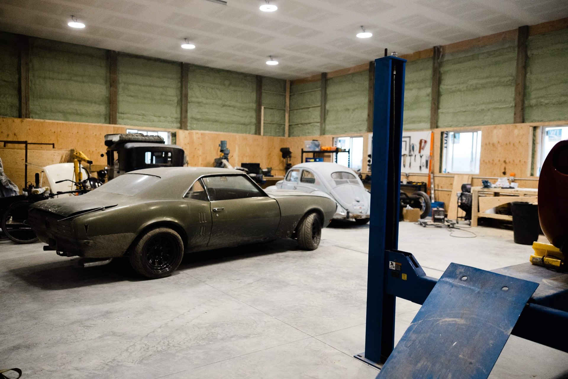 Post-frame garage interior with vehicle storage near the Shuswap