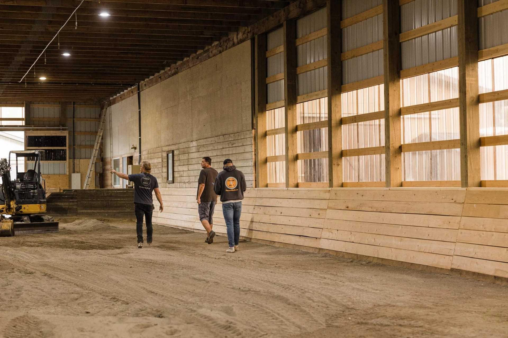 Interior of large enclosed riding arena with kickboards
