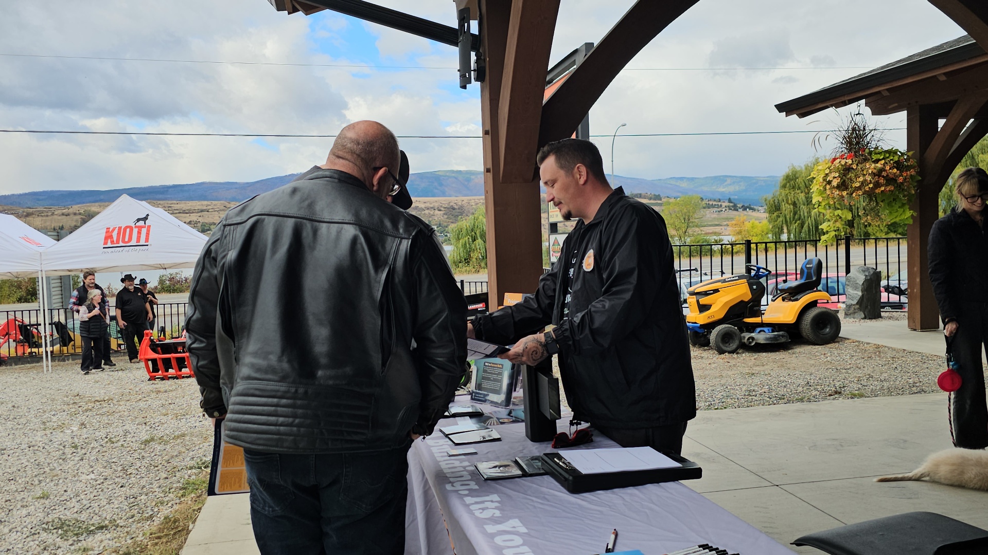 Farrow Built field sales representative meeting with property owner on rural BC acreage
