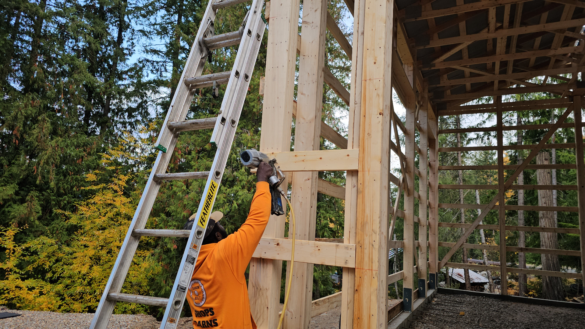 Farrow Built framer working on post-frame construction