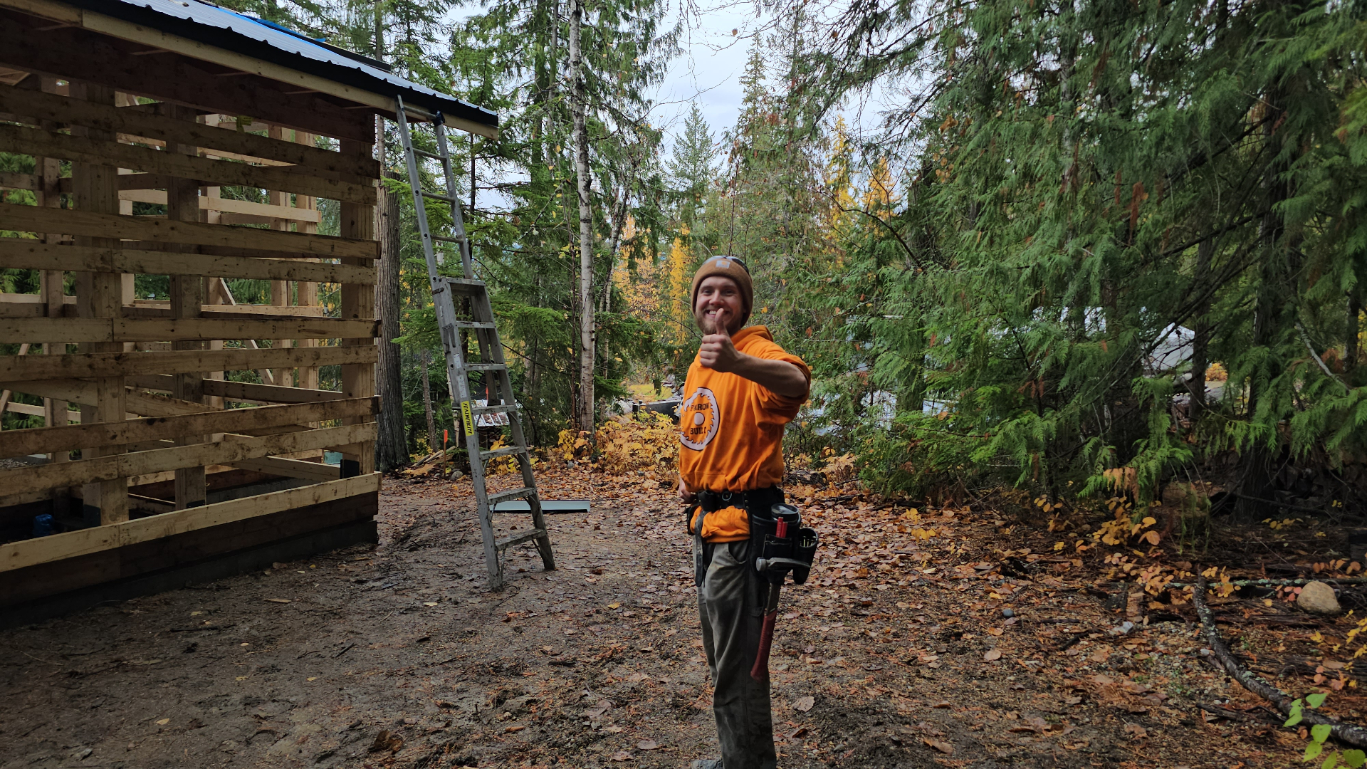 Farrow Built worker giving thumbs up at job site